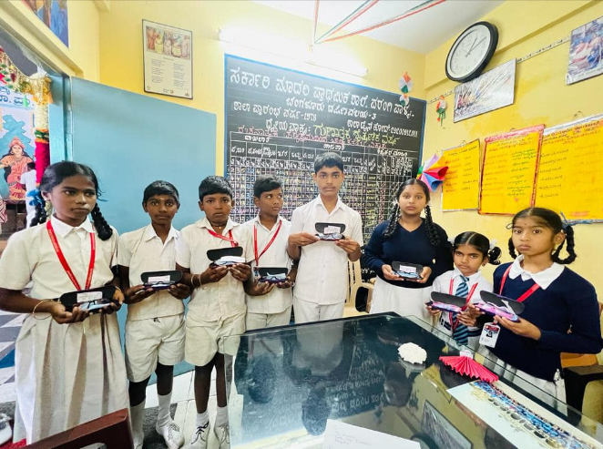 Distributing specs to the students and teachers wh...